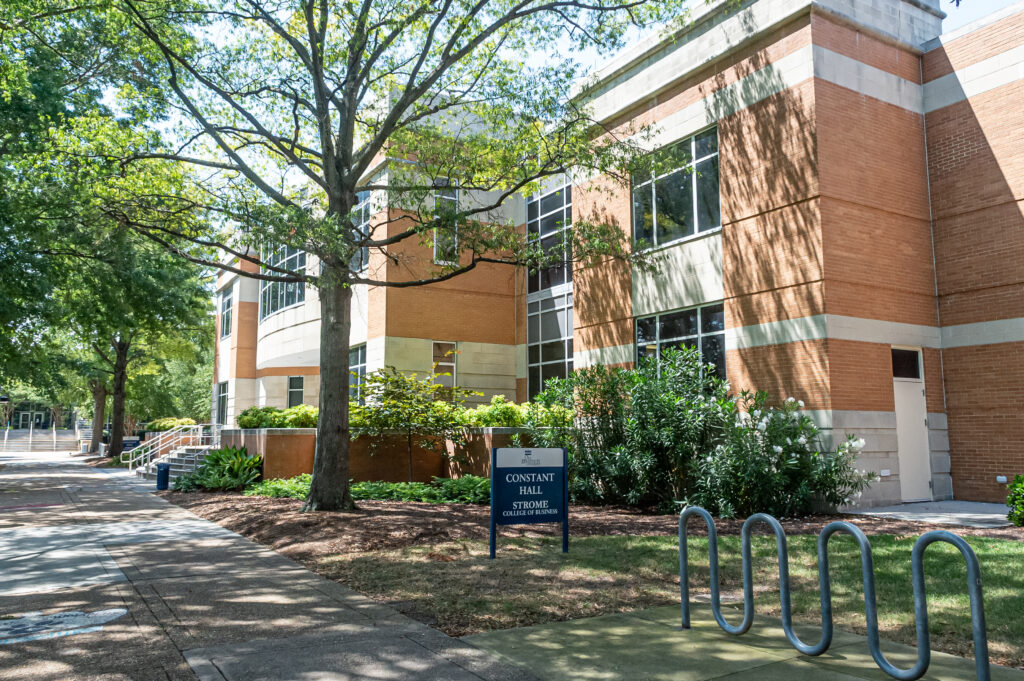 Photo of the ODU Strome College of Business Building in dappled sunlight