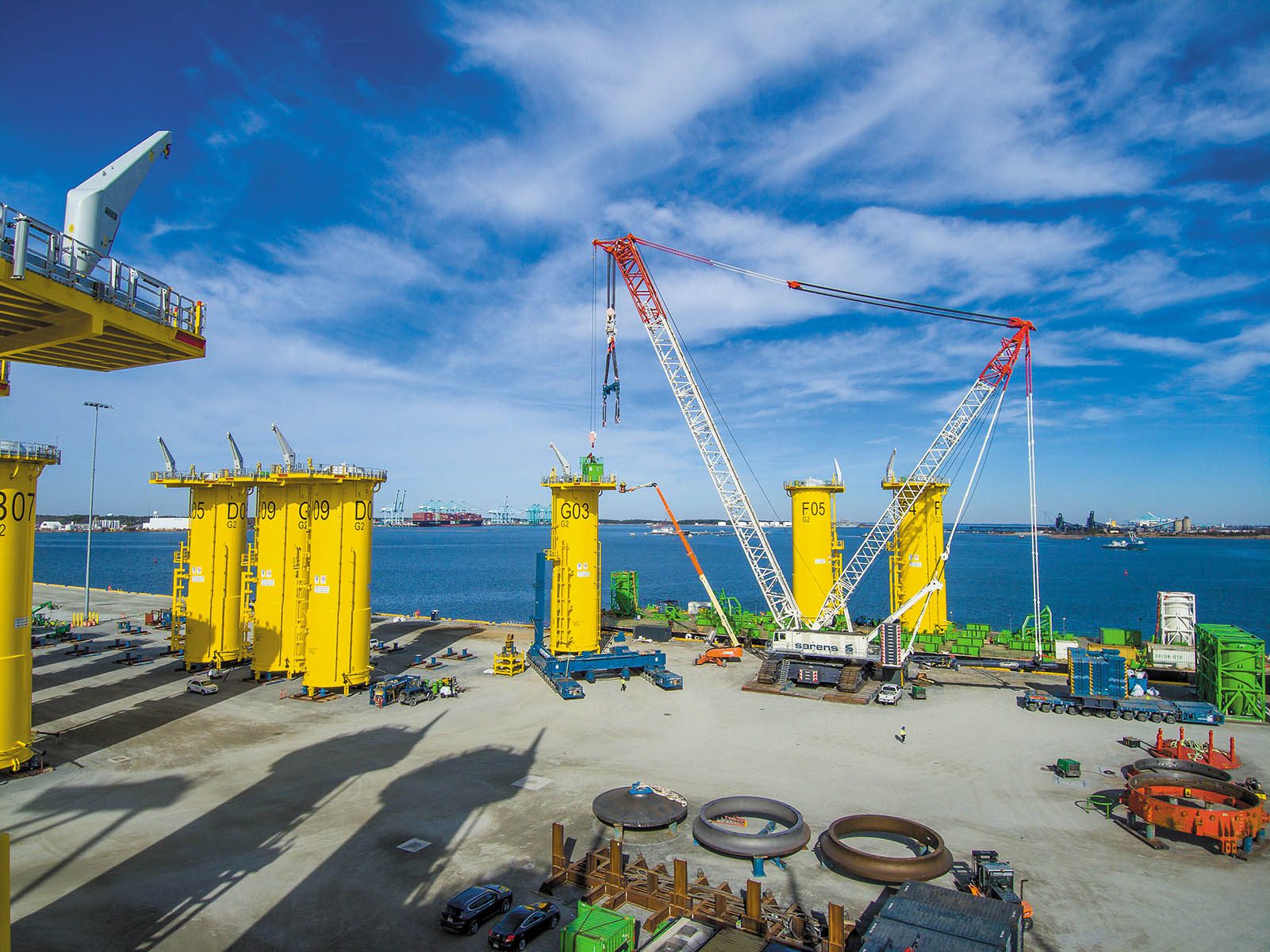 Cranes in action at the Coastal Virginia offshore wind facility in Portsmouth. Photo courtesy of Dominion Energy