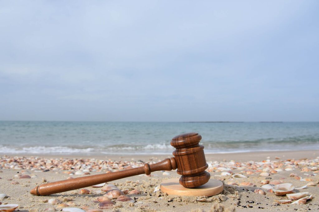 Judge hammer on the beach