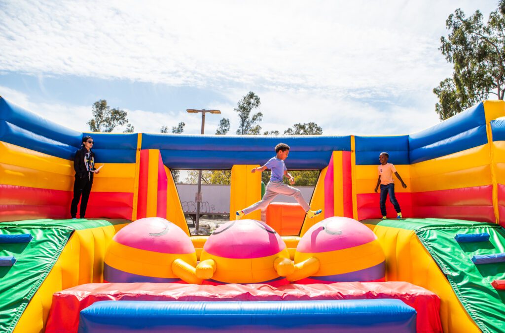 kids playing in bounce house